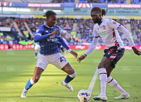 251025 - Bolton Wanderers v Cardiff City - Sky Bet League 1 - Tanaswa Nyakuhwa of Cardiff and Richard Taylor of Bolton