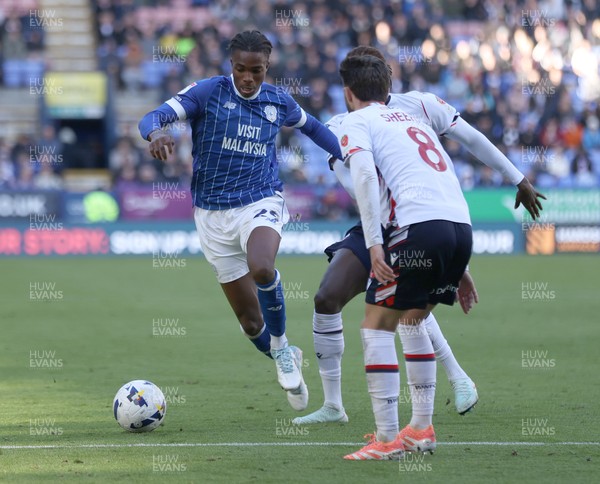 251025 - Bolton Wanderers v Cardiff City - Sky Bet League 1 - Tanaswa Nyakuhwa of Cardiff tries to pass Josh Sheehan of Bolton