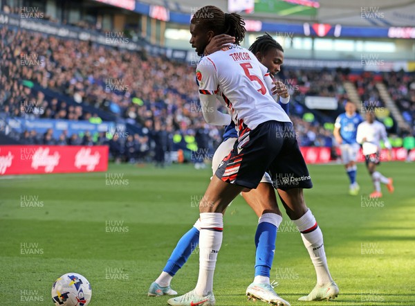 251025 - Bolton Wanderers v Cardiff City - Sky Bet League 1 - Tanaswa Nyakuhwa of Cardiff and Richard Taylor of Bolton