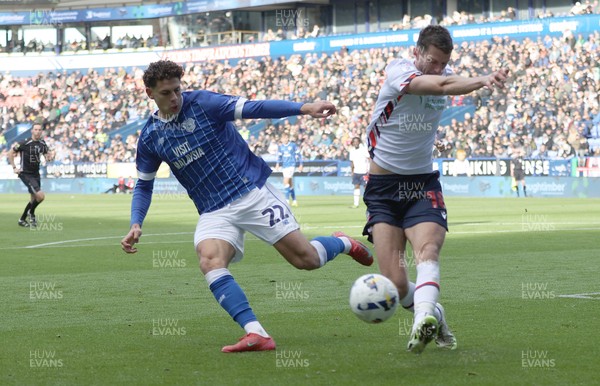 251025 - Bolton Wanderers v Cardiff City - Sky Bet League 1 - Eoin Toal of Bolton clears from Yousef Saleh of Cardiff in the box