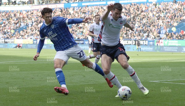 251025 - Bolton Wanderers v Cardiff City - Sky Bet League 1 - Eoin Toal of Bolton clears from Yousef Saleh of Cardiff in the box