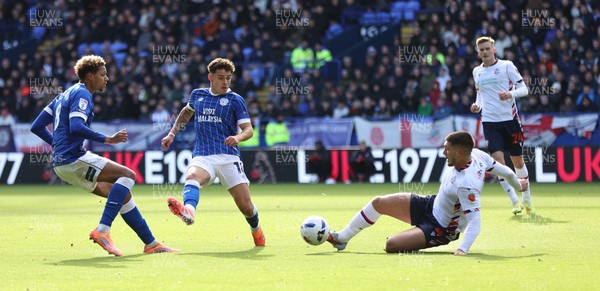 251025 - Bolton Wanderers v Cardiff City - Sky Bet League 1 - Omari Kellyman of Cardiff and Alex Robertson of Cardiff try to get the ball from Xavier Simons of Bolton