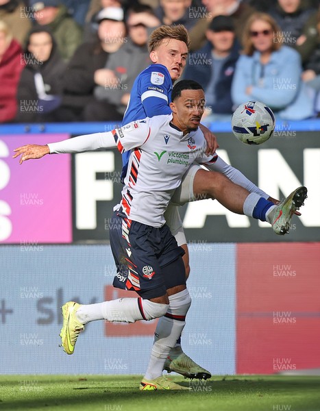 251025 - Bolton Wanderers v Cardiff City - Sky Bet League 1 - Rubin Colwill of Cardiff and Mason Burstow of Bolton