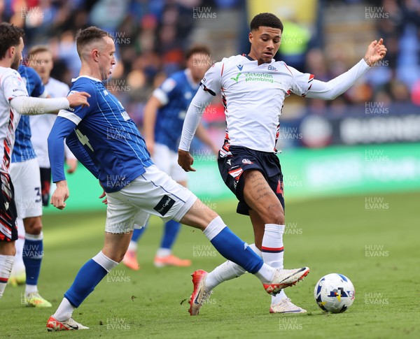 251025 - Bolton Wanderers v Cardiff City - Sky Bet League 1 - David Turnbull of Cardiff and Mason Burstow of Bolton