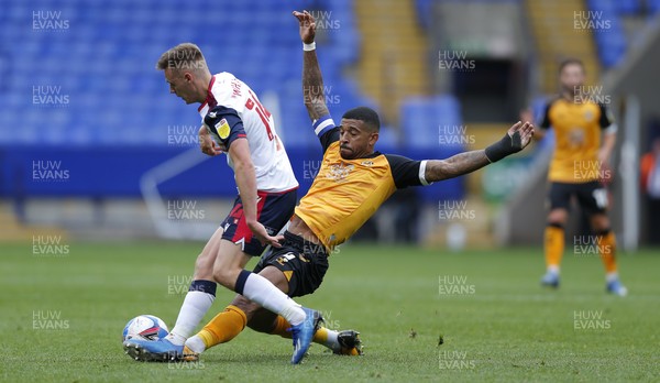 260920 - Bolton Wanderers v Newport County - Sky Bet League 2 - Tristan Abrahams of Newport County and George Taft of Bolton Wanderers