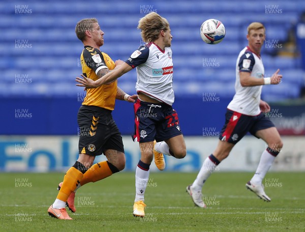 260920 - Bolton Wanderers v Newport County - Sky Bet League 2 - Scot Bennett of Newport County and Lloyd Isgrove of Bolton