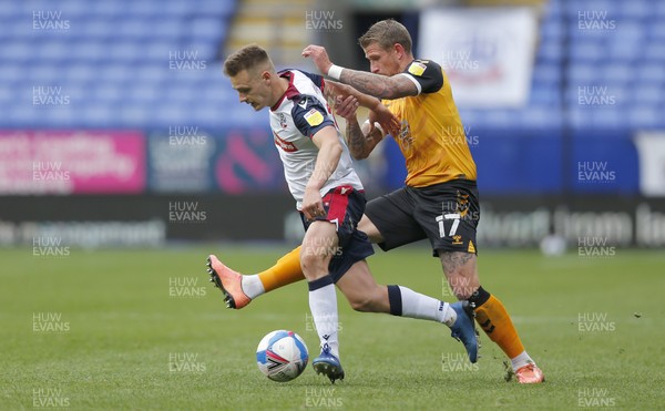 260920 - Bolton Wanderers v Newport County - Sky Bet League 2 - Scot Bennett of Newport County and Tom White of Bolton Wanderers