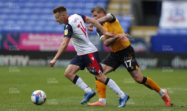 260920 - Bolton Wanderers v Newport County - Sky Bet League 2 - Scot Bennett of Newport County and Tom White of Bolton Wanderers