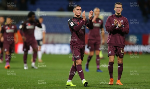101118 - Bolton Wanderers v Swansea City - Sky Bet Championship - Connor Roberts  of Swansea and Besant Celina of Swansea applaud the fans at the end of the match
