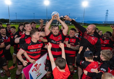 060526 - Bonymaen RFC v Glynneath RFC, National Championship West - Bonymaen captain Joe Yates celebrates with the team and fans as he lifts the National Championship West trophy