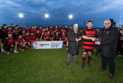 060526 - Bonymaen RFC v Glynneath RFC, National Championship West - Bonymaen captain Joe Yates receives the National Championship West trophy from WRU National Council Member Jeff Davies right and Peter Hansford