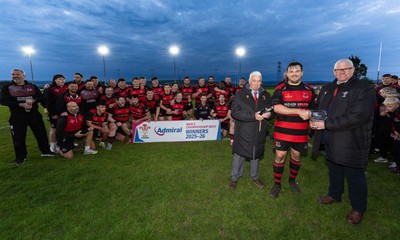 060526 - Bonymaen RFC v Glynneath RFC, National Championship West - Bonymaen captain Joe Yates receives the National Championship West trophy from WRU National Council Member Jeff Davies right and Peter Hansford