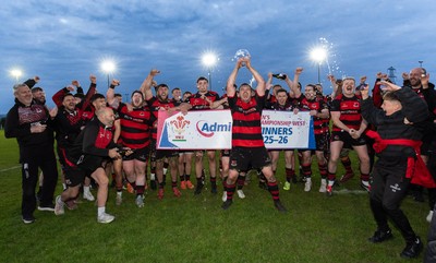 060526 - Bonymaen RFC v Glynneath RFC, National Championship West - Bonymaen captain Joe Yates celebrates with the team and fans as he lifts the National Championship West trophy