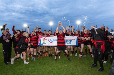 060526 - Bonymaen RFC v Glynneath RFC, National Championship West - Bonymaen captain Joe Yates celebrates with the team and fans as he lifts the National Championship West trophy