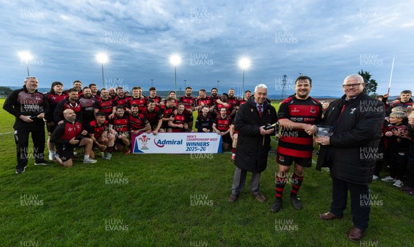 060526 - Bonymaen RFC v Glynneath RFC, National Championship West - Bonymaen captain Joe Yates receives the National Championship West trophy from WRU National Council Member Jeff Davies right and Peter Hansford