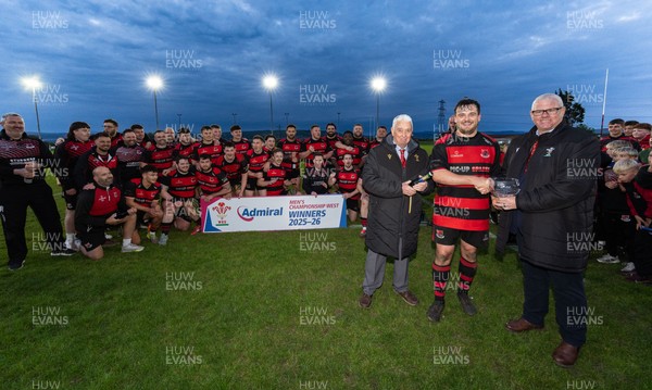 060526 - Bonymaen RFC v Glynneath RFC, National Championship West - Bonymaen captain Joe Yates receives the National Championship West trophy from WRU National Council Member Jeff Davies right and Peter Hansford
