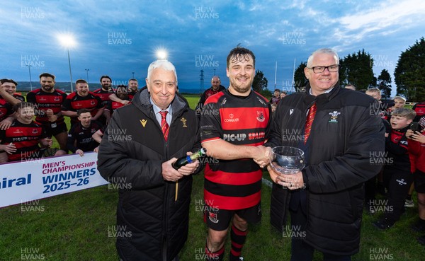 060526 - Bonymaen RFC v Glynneath RFC, National Championship West - Bonymaen captain Joe Yates receives the National Championship West trophy from WRU National Council Member Jeff Davies right and Peter Hansford