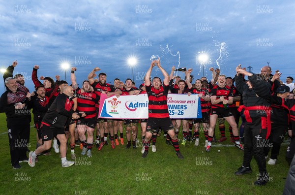 060526 - Bonymaen RFC v Glynneath RFC, National Championship West - Bonymaen captain Joe Yates celebrates with the team and fans as he lifts the National Championship West trophy