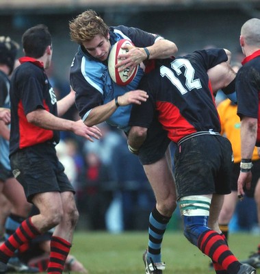 080203 - Bonymaen v Cardiff - Principality Cup - Nicky Robinson is tackled by Gwyn Rolands