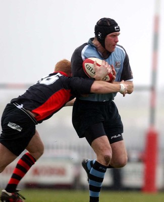 080203 - Bonymaen v Cardiff - Principality Cup - Cardiff's Matt Allen tries to get past by Darril Williams 