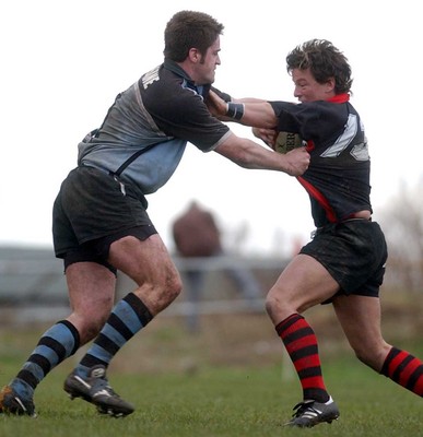 080203 - Bonymaen v Cardiff - Principality Cup - Cardiff's Dan McShane stops James Davies