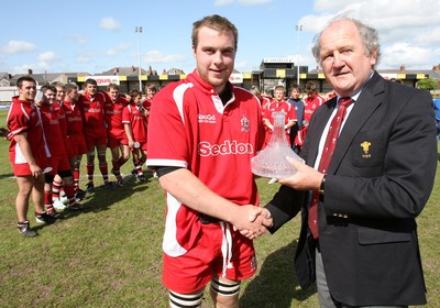 19.05.07 - Bonymaen Youth v Pontypool United Youth, WRU National Youth League Play off Final, Newport Pontypool United captain Dan Crandon is presented with the League trophy by Alan Jones of the WRU 