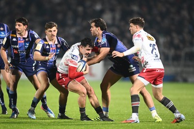 131225 - Bordeaux-Begles v Scarlets - Investec Champions Cup - Jac Davies of Scarlets and Damian Penaud of UBB and Xan Mousques of UBB