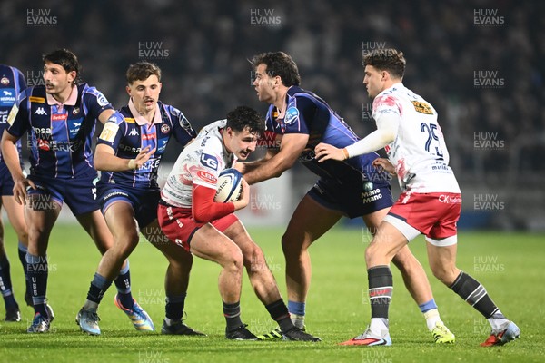 131225 - Bordeaux-Begles v Scarlets - Investec Champions Cup - Jac Davies of Scarlets and Damian Penaud of UBB and Xan Mousques of UBB