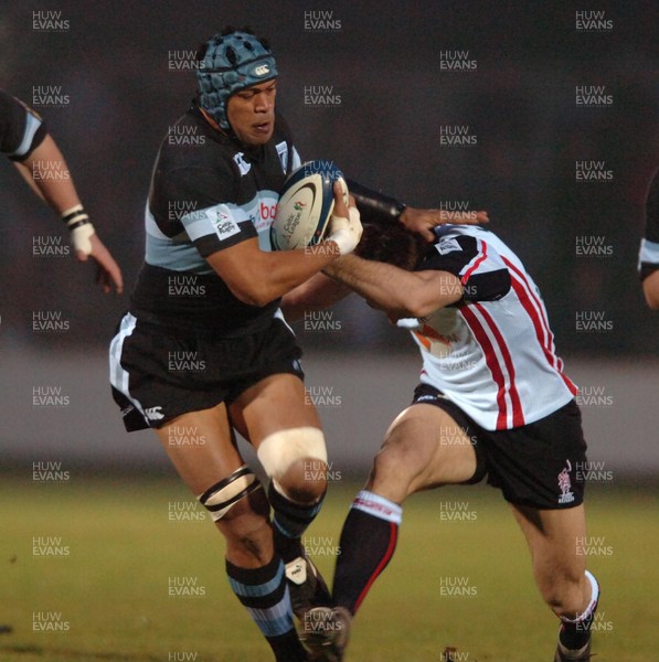 080106  Borders v Cardiff Blues  Maama Molitika is tackled by Garry Law   