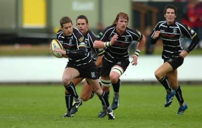 12.05.07 - Borders v Ospreys - Magners League - Ospreys Jonathan Vaughton is supported by Lee Byrne, Lee Beach and james Hook 