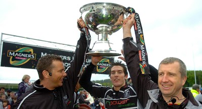 12.05.07 - Borders v Ospreys - Magners League - Ospreys Coach, Sean Holley(L), James Hook and Head Coach, Lyn Jones(R) celebrate with the Magners League trophy  