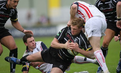 12.05.07...Border Reivers v Ospreys, Magners League Ospreys' Nikki Walker is held 