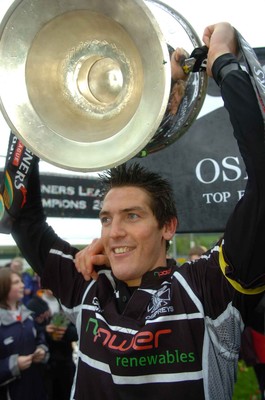 12.05.07...Border Reivers v Ospreys, Magners League Ospreys' James Hook celebrates with the Magners League trophy 