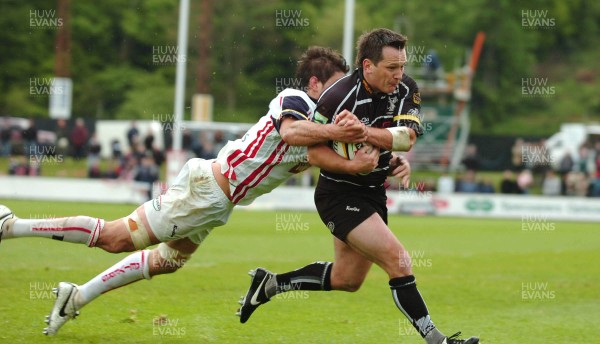 12.05.07 - Borders v Ospreys - Magners League - Ospreys Shaun Conner is tackled by Kelly Brown 