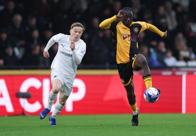 071225 - Boreham Wood v Newport County, Emirates FA Cup 2nd Round - Nathan Opoku of Newport County charges forward