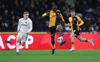 071225 - Boreham Wood v Newport County, Emirates FA Cup 2nd Round - Nathan Opoku of Newport County charges forward