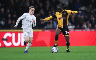 071225 - Boreham Wood v Newport County, Emirates FA Cup 2nd Round - Nathan Opoku of Newport County charges forward