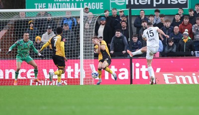 071225 - Boreham Wood v Newport County, Emirates FA Cup 2nd Round - Jeff King of Boreham Wood shoots to score the opening goal