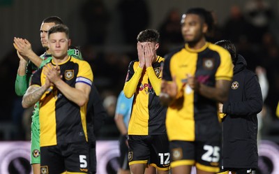 071225 - Boreham Wood v Newport County, Emirates FA Cup 2nd Round - Newport County players dejected at the end of the match