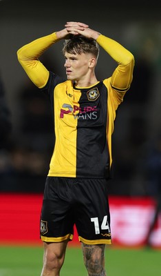 071225 - Boreham Wood v Newport County, Emirates FA Cup 2nd Round - Kai Whitmore of Newport County dejected at the end of the match