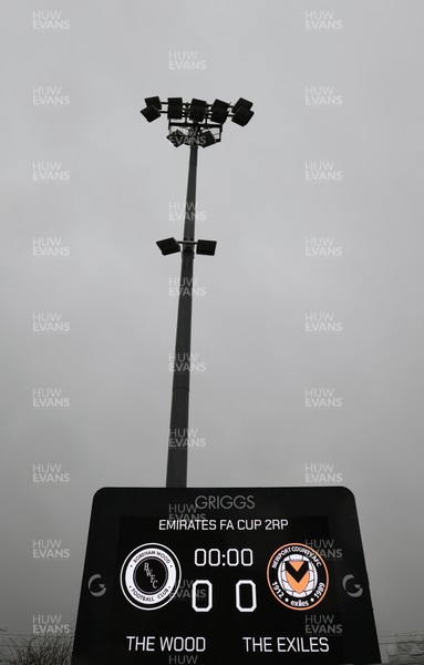 071225 - Boreham Wood v Newport County, Emirates FA Cup 2nd Round - The scoreboard ahead of the match