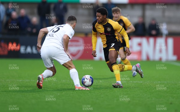 071225 - Boreham Wood v Newport County, Emirates FA Cup 2nd Round - Bobby Kamwa of Newport County takes on Jeff King of Boreham Wood