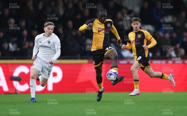 071225 - Boreham Wood v Newport County, Emirates FA Cup 2nd Round - Nathan Opoku of Newport County charges forward