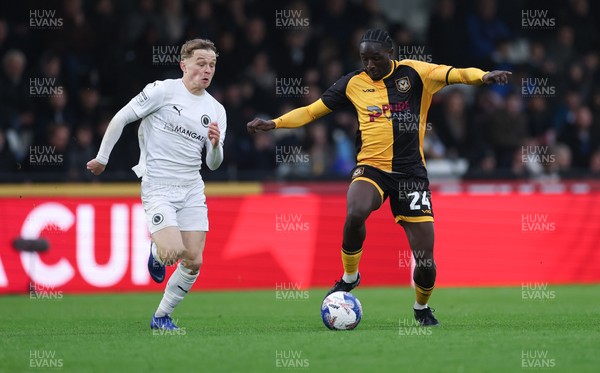 071225 - Boreham Wood v Newport County, Emirates FA Cup 2nd Round - Nathan Opoku of Newport County charges forward