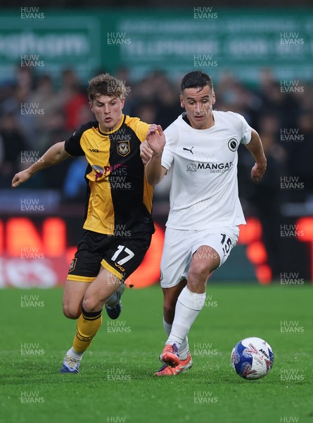 071225 - Boreham Wood v Newport County, Emirates FA Cup 2nd Round - Jeff King of Boreham Wood and Tom Davies of Newport County compete for the ball