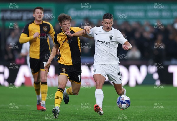 071225 - Boreham Wood v Newport County, Emirates FA Cup 2nd Round - Jeff King of Boreham Wood and Tom Davies of Newport County compete for the ball