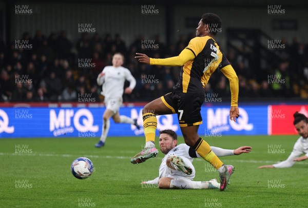 071225 - Boreham Wood v Newport County, Emirates FA Cup 2nd Round - Bobby Kamwa of Newport County shoots at goal