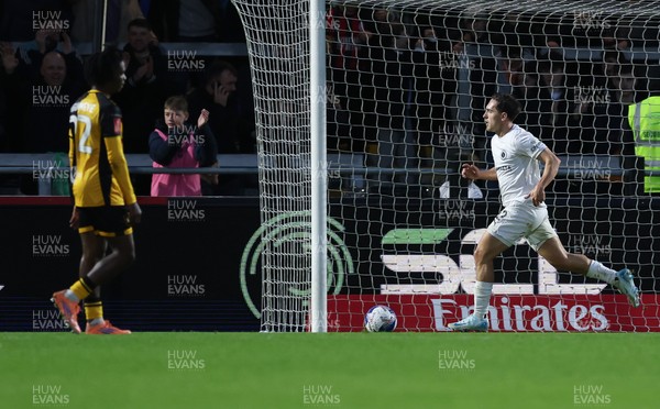 071225 - Boreham Wood v Newport County, Emirates FA Cup 2nd Round - Matt Rush of Boreham Wood races off to celebrate after scoring the third goal