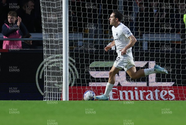 071225 - Boreham Wood v Newport County, Emirates FA Cup 2nd Round - Matt Rush of Boreham Wood races off to celebrate after scoring the third goal