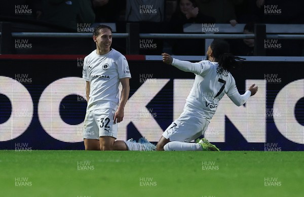 071225 - Boreham Wood v Newport County, Emirates FA Cup 2nd Round - Matt Rush of Boreham Wood celebrates after scoring the third goal with Erico Sousa of Boreham Wood